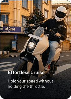 A rider cruising through a city street on a P2